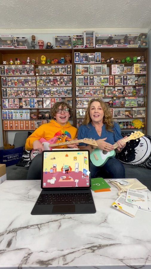 Instagram post by @stacieinatlanta for Loog Guitars. Caption reads: I LOVE MY NEW @loogguitars GUITAR!!! Check out my....