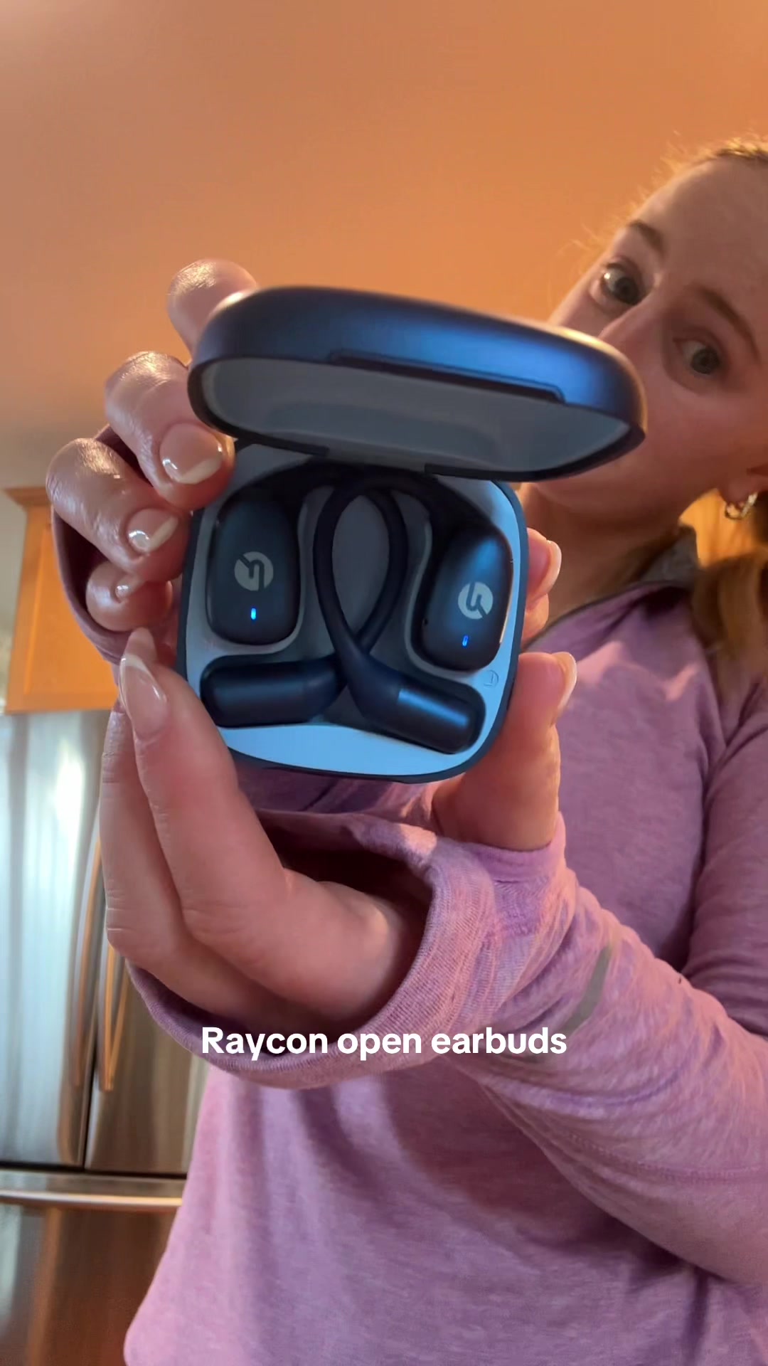 TikTok post by @devinris for Raycon. Caption reads: [...] still hear what’s going on around you💙....