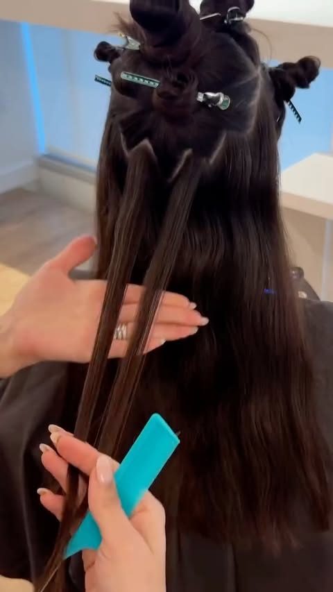 Instagram post by @jessicascotthair for Moroccanoil Professionals. Caption reads: Lux Brunette ⚜️⚜️⚜️ 

Let me know below if you....