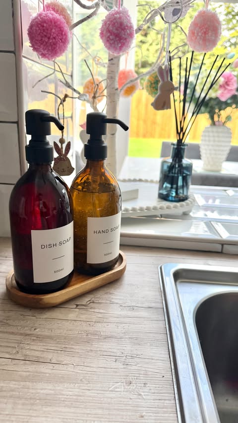 Instagram post by @athomewiththecollins for NAMIE HOME. Caption reads: [...] everyday bottles for these gorgeous....