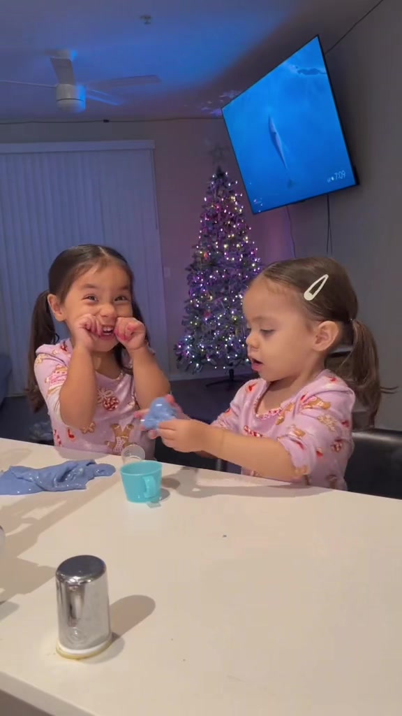 TikTok post by @lovely_noelyyy for Momcozy. Caption reads: Nothing better than those sweet tiny arms wrapped....