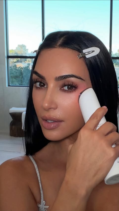 Instagram post by @kimkardashian for Medicube. Caption reads: [...] core routine with my booster pro x2....