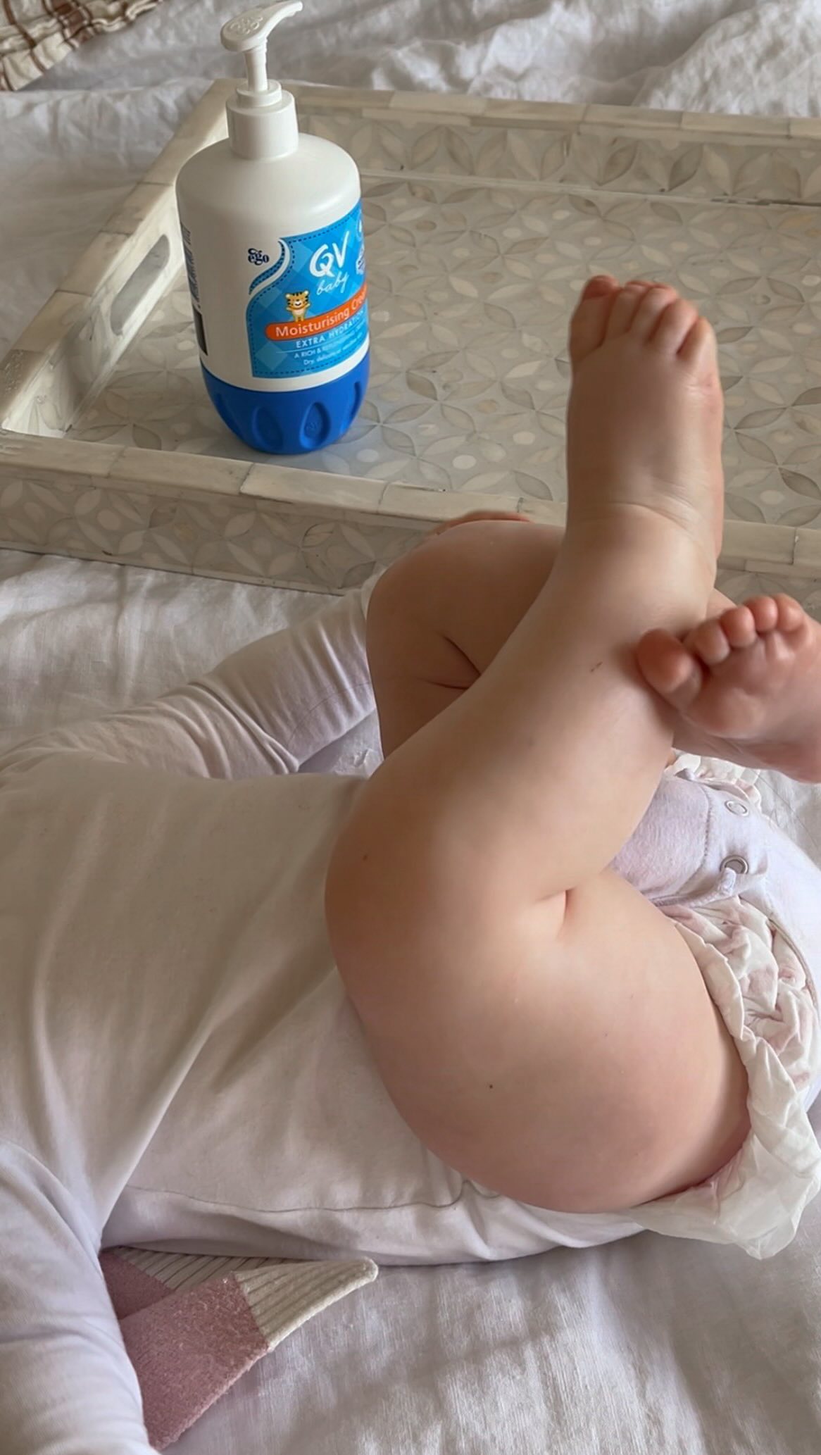 Instagram post by @madeleineedwards for QV Skincare. Caption reads: Looking after Carmy’s skin and making sure she....