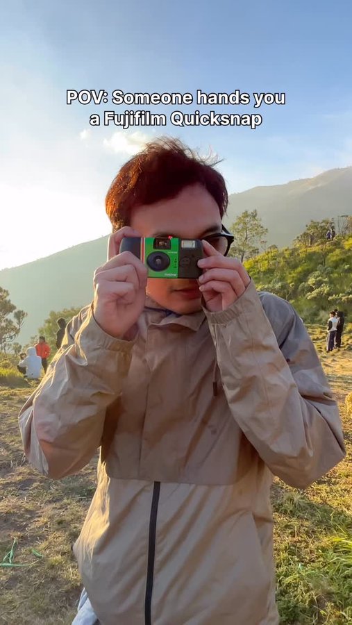 Instagram post by @mahardikayusuf for Fujifilm. Caption reads: Traveling 🤝 Fujifilm Quicksnap 

#quicksnap....