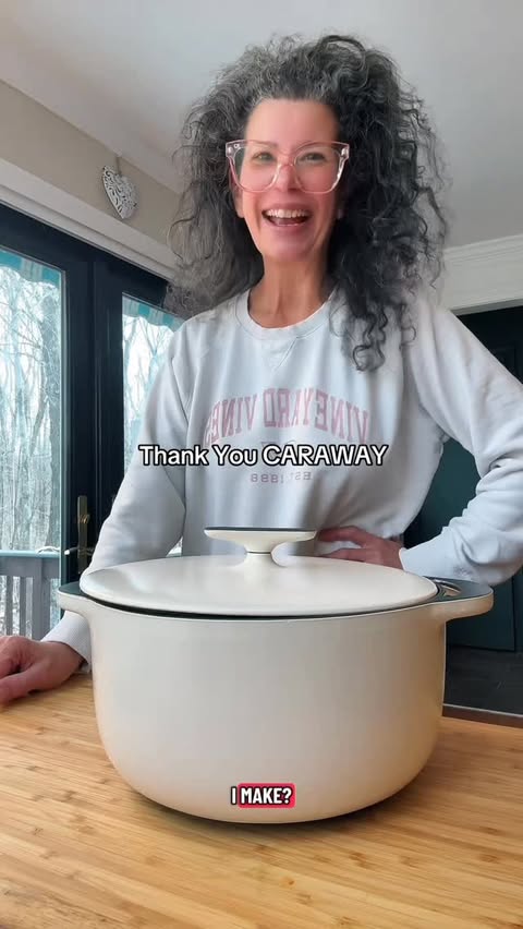 Instagram post by @mommailena for Caraway Home. Caption reads: Unboxing With Me. A beautiful cast iron Dutch oven....