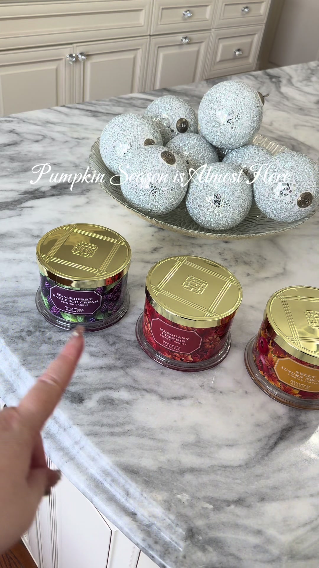 TikTok post by an influencer for QVC. Caption reads: [...] +Co Set of three 14oz Candles @QVC, Inc....
