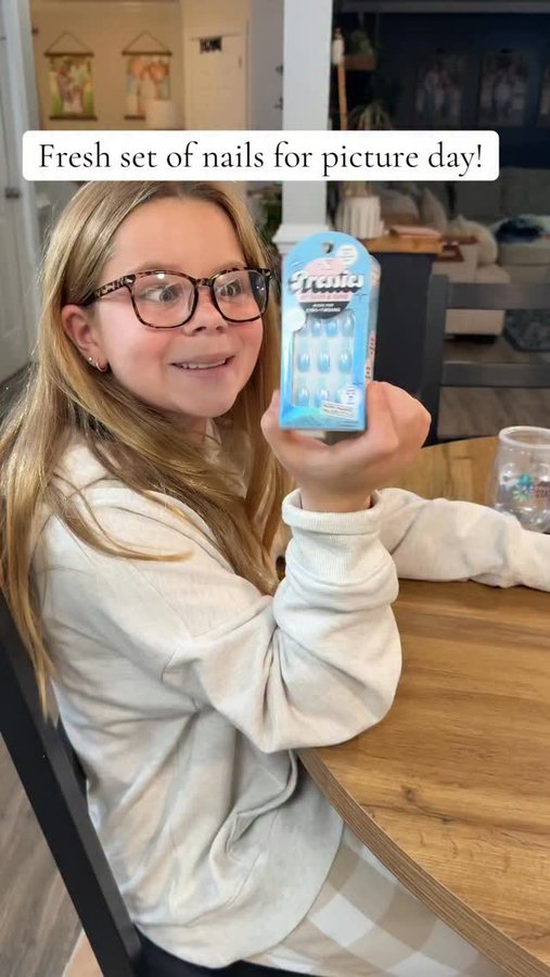 Instagram post by @theboggs_family for Olive & June. Caption reads: My nails might be ratchet but at least hers will....