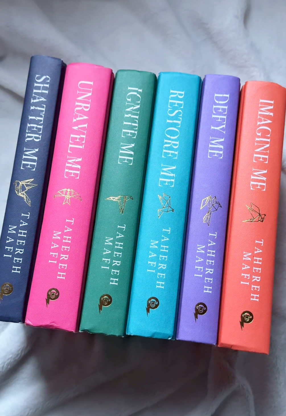 TikTok post by @kezzadiaries for HarperCollinsUK. Caption reads: [...] editions look so good together!....