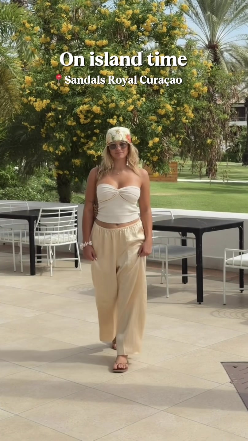 TikTok post by @shaysullivann for Sandals Resorts. Caption reads: [...] the island in a Mini Cooper. @Sandals....