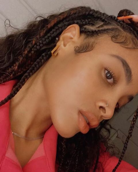 Instagram post by @robynora for Tini Lux. Caption reads: @tiniluxjewelry 💘 #ad.