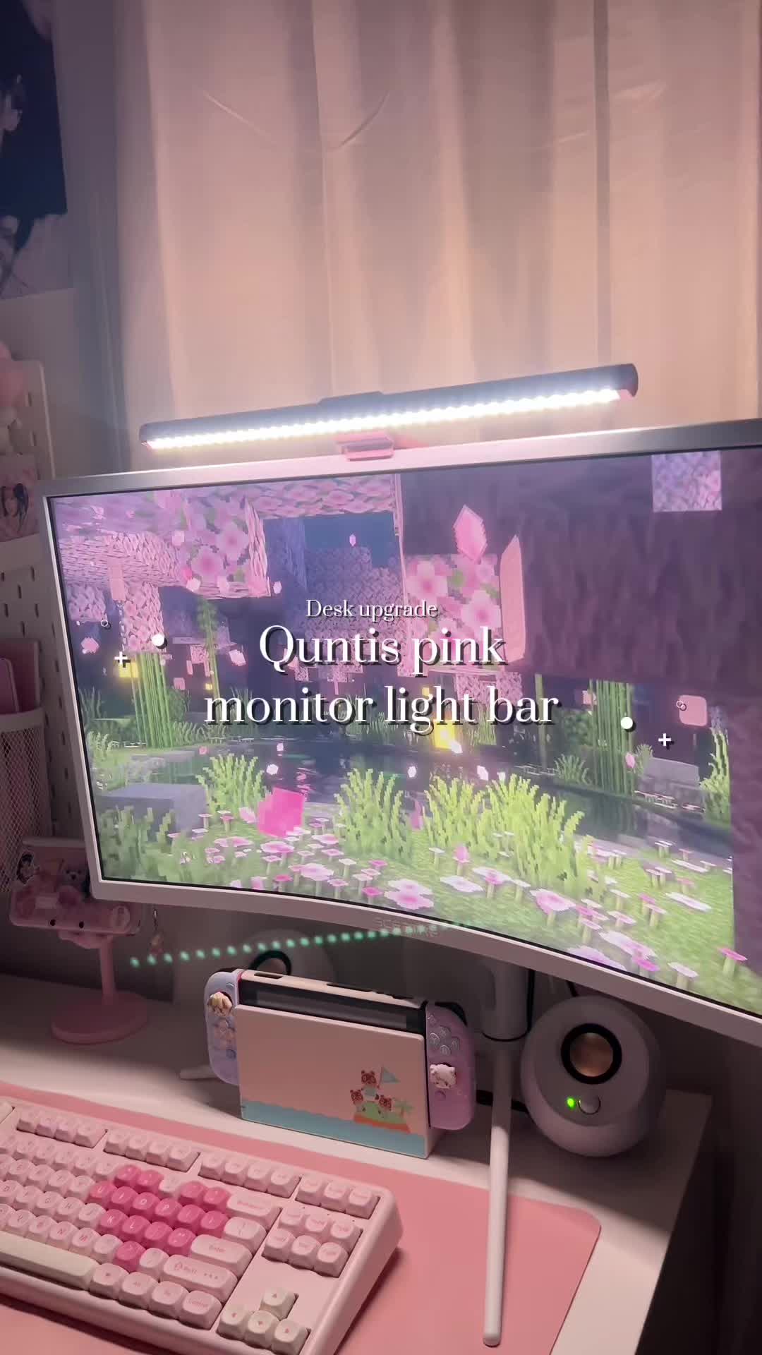 TikTok post by @riaaonline for Quntis. Caption reads: In love with this @Quntis pink monitor light bar....