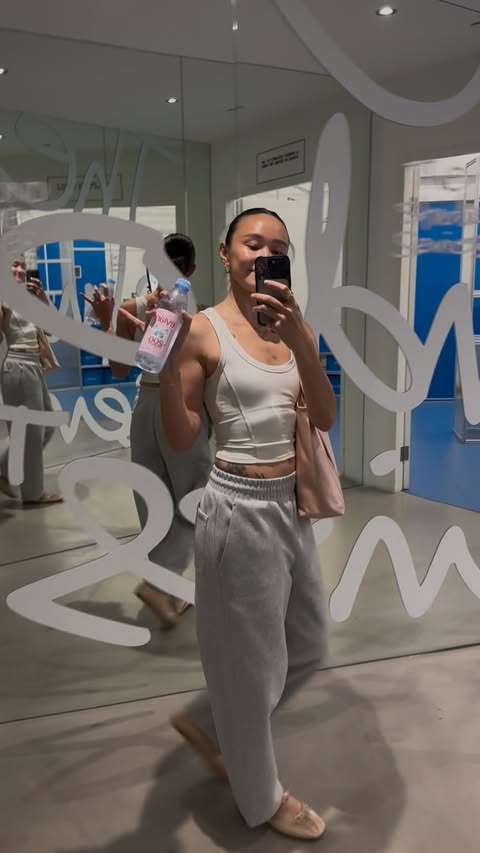 Instagram post by @collettemiles for evian. Caption reads: [...] hydrated is non-negotiable for me. Team....