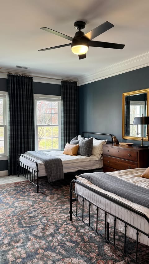 Instagram post by @mallorynikolaushome for Twopagescurtains. Caption reads: We just replaced the boys drapes with these....