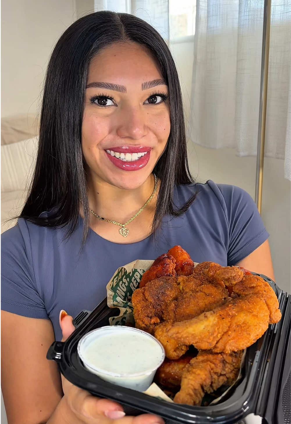 TikTok post by @keilapacheco for Wingstop. Caption reads: Lets get ready and eat some @Wingstop 💚 What....