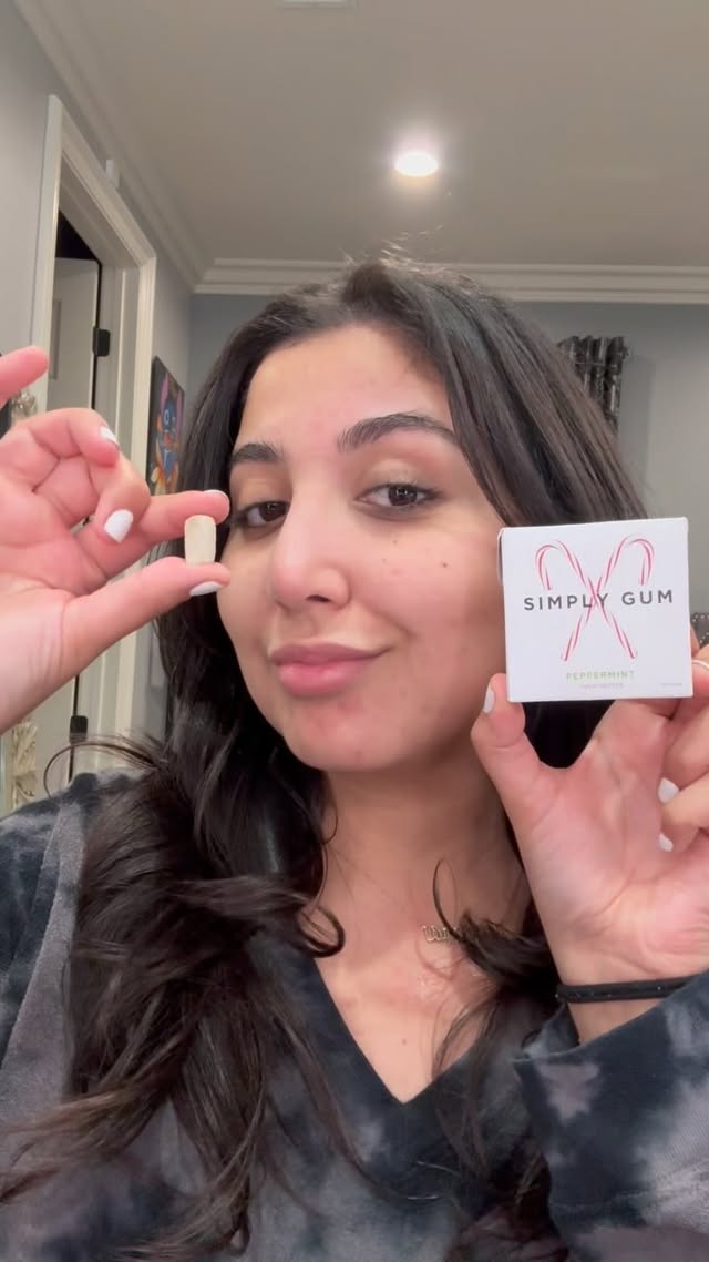 Instagram post by @makeupby__mar for Simply Gum. Caption reads: Savor the festive spirit with @simplygum Candy....