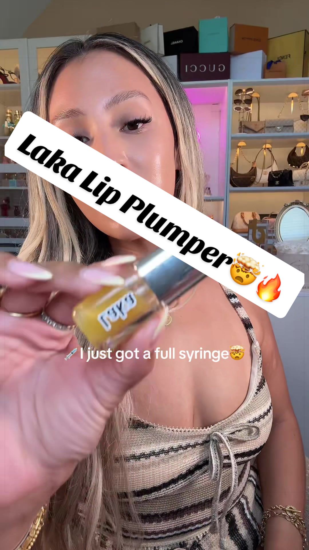 TikTok post by @giniglow for LAKA. Caption reads: 🤯💉🔥This Laka Lip Plumper is NO JOKE #laka....