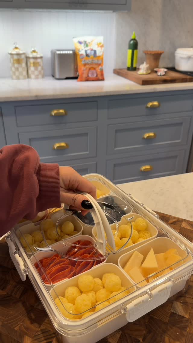 Instagram post by @brivenzke for LesserEvil. Caption reads: healthy snackle box idea with our fave....