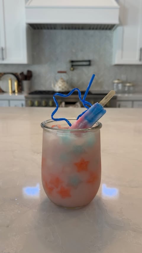 Instagram post by @mikayla.mcneany for Natalie's Orchid Island Juice. Caption reads: 4th of July loaded lemonade 💙🫧🇺🇸🎇 How cute....