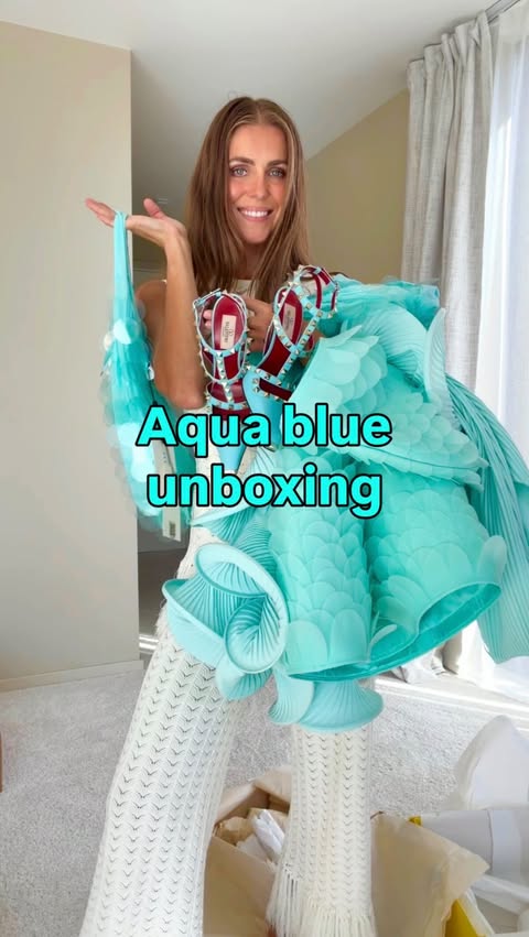 Instagram post by @ninasandbech for Valentino. Caption reads: Aqua blue unboxing🩵 AD// some pieces are borrowed....