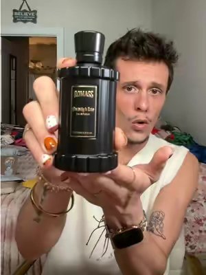 TikTok post by @jawshkaylub for Romass. Caption reads: [...] has sandalwood and coffee notes with it....