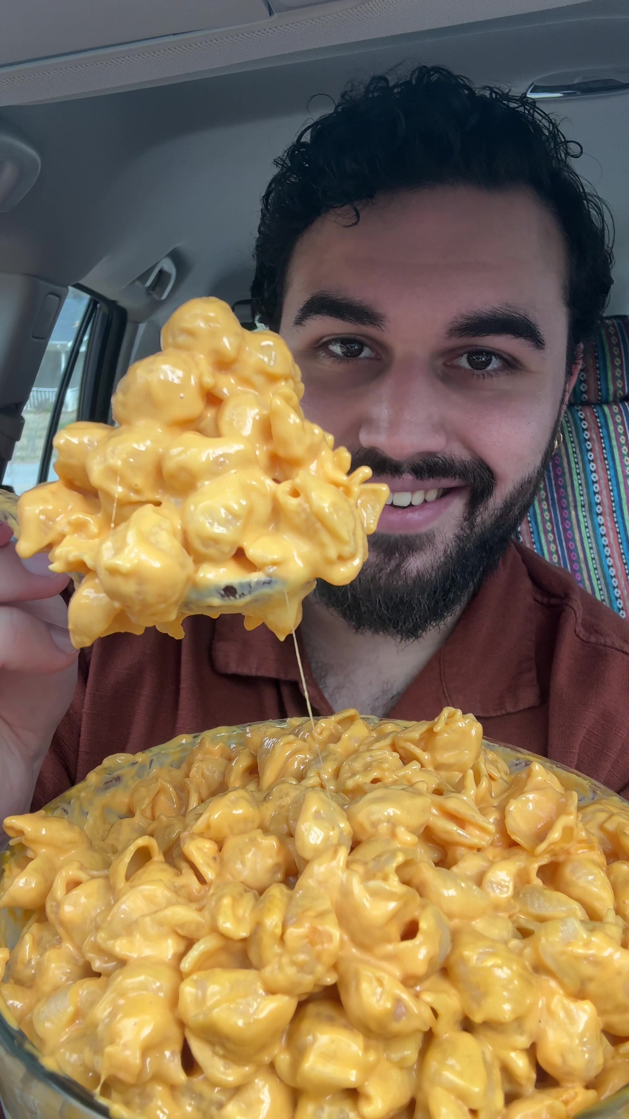 TikTok post by @guacbites for Goodles. Caption reads: Super Cheesy Mac & Cheese from @GOODLES....