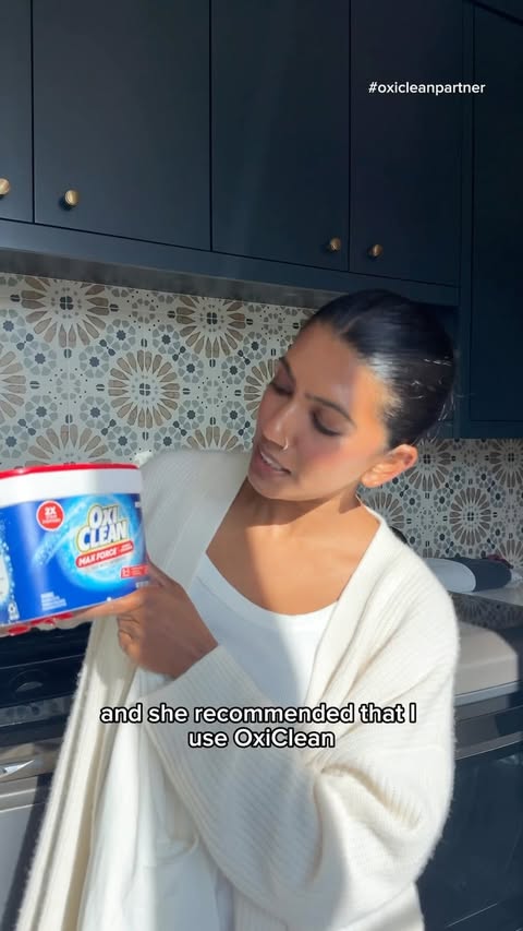 Instagram post by @queencitytrends for OxiClean. Caption reads: [...] human? 😅 Enter my new best friend:....