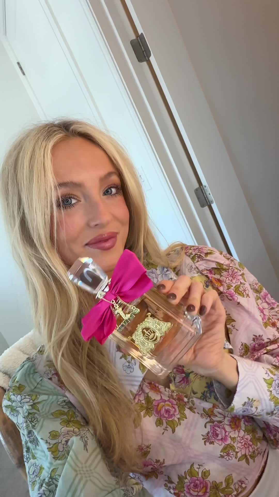 TikTok post by @elliepeterson3 for Juicy Couture. Caption reads: #ad I’m shopping Juicy Couture Viva La Juicy this....