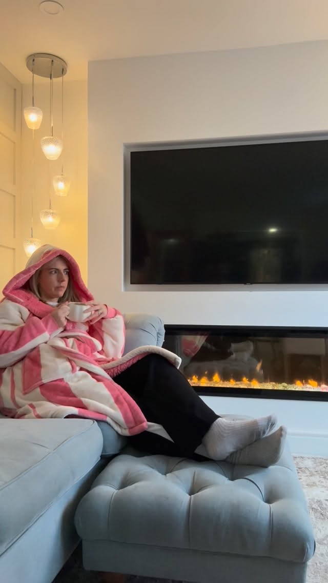 Instagram post by @housetohome_23 for The Oodie. Caption reads: My secret to surviving cold mornings? This....