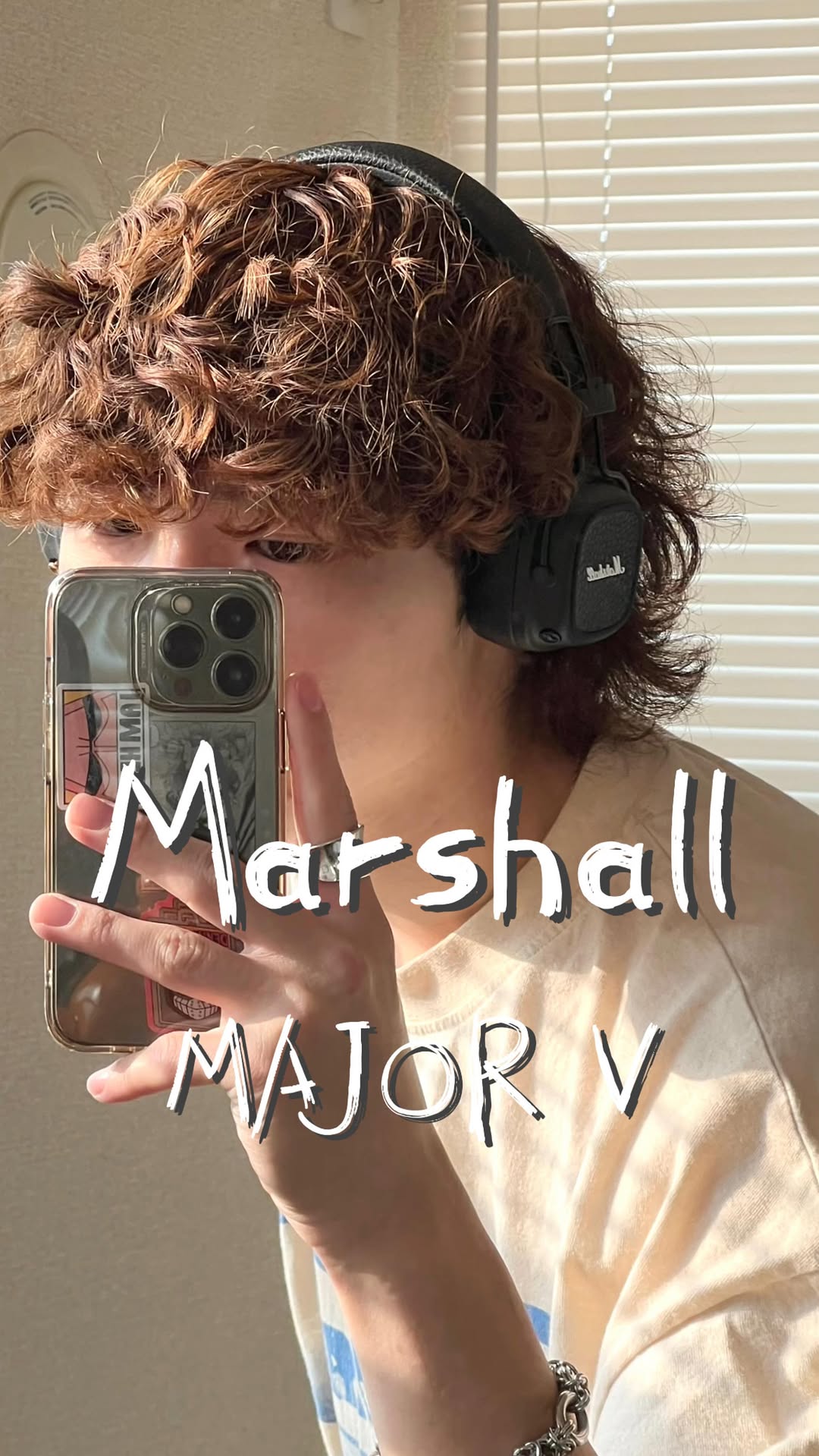 Instagram post by @1e_e__ for Marshall Headphones. Caption reads: アメカジにも古着にもなんでも合う🎧

@marshallheadphones....