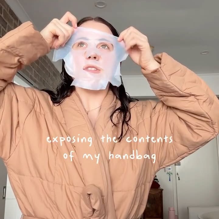 Instagram post by @lucymneville for Adore Beauty. Caption reads: This chaotic handbag audit is courtesy of Adore....