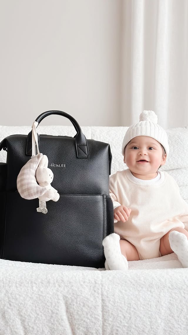 Instagram post by @ourviennaliving for Henlee. Caption reads: [...] is the Jordie Luxe backpack by @henlee.co....