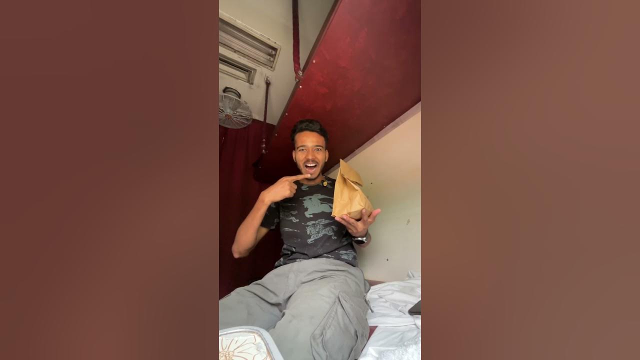 YouTube post by @travelerram for Swiggy. Caption reads: AC Class Vs Sleeper class feat. food on train from....
