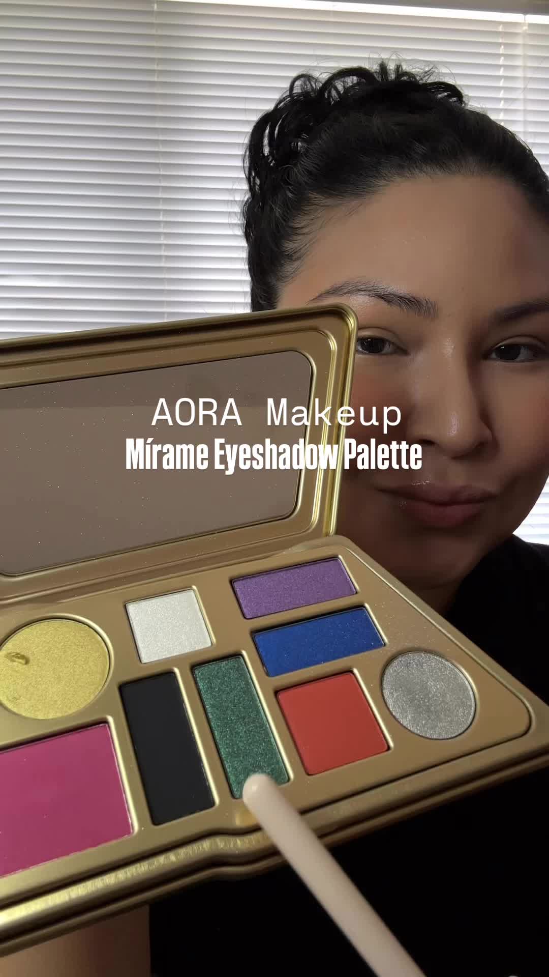 TikTok post by @andie_sorto for Aora Makeup. Caption reads: [...] a super easy eyeshadow look using the @Aora....