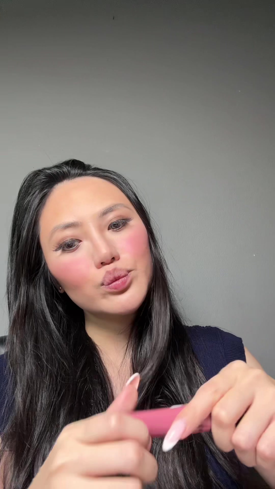 TikTok post by @tiffninikincade for HERA KR. Caption reads: Tinted shin lip serum@HERA KR such a beautiful....