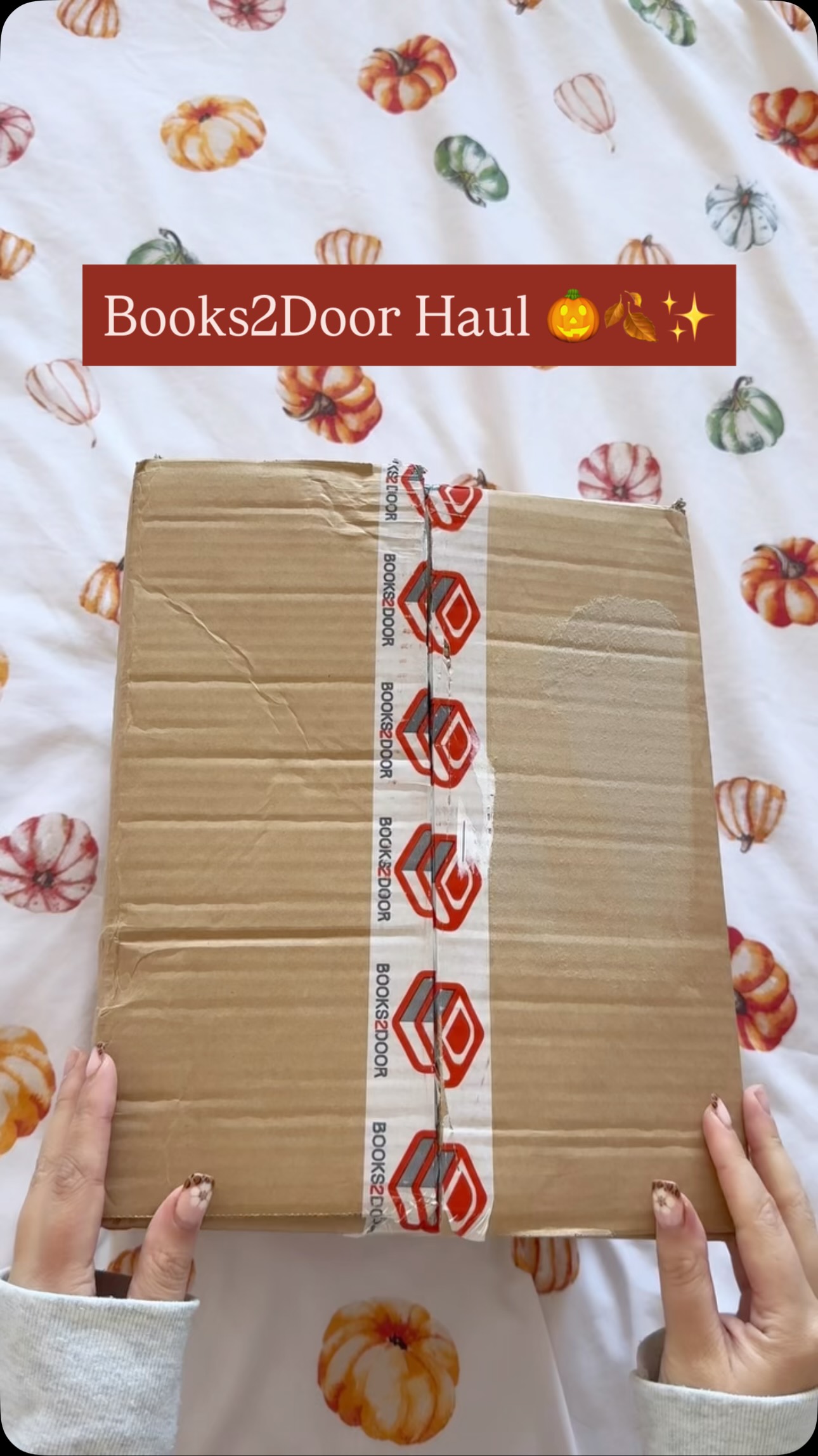 Instagram post by @abbeigh.reads for Books2Door. Caption reads: [AD] My Books2Door haul 🎃🍂✨
10% off code: [...].