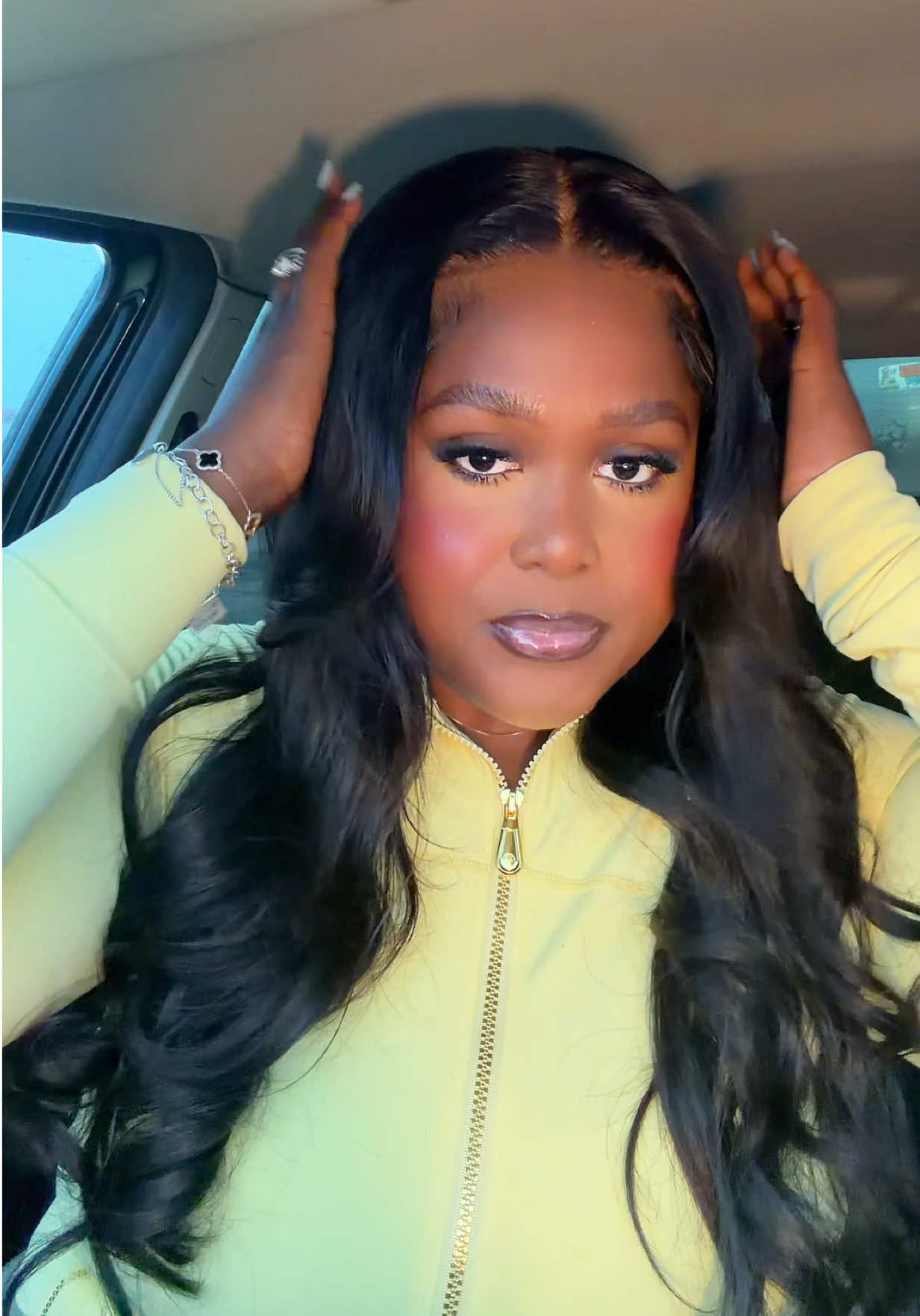 TikTok post by @itskyraie for Sunber Hair. Caption reads: Answer the phone 📞 @Sunber Hair #gluelesswigs....