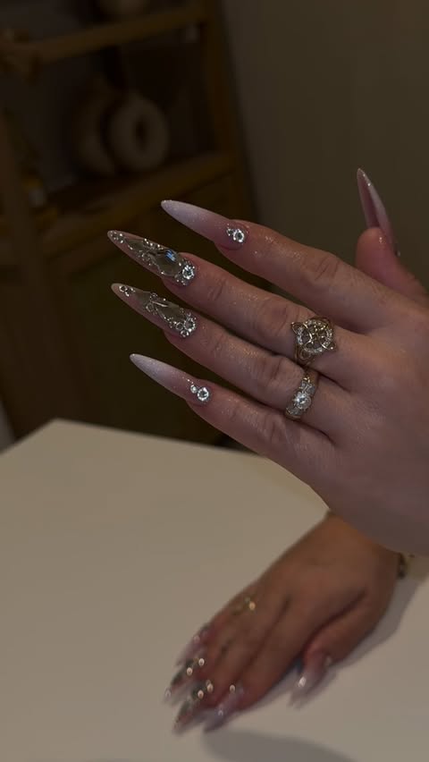 Instagram post by @nailsbysarahii__ for Bluestreak Crystals. Caption reads: [...] Crystal gel topcoat, 3XL tips....