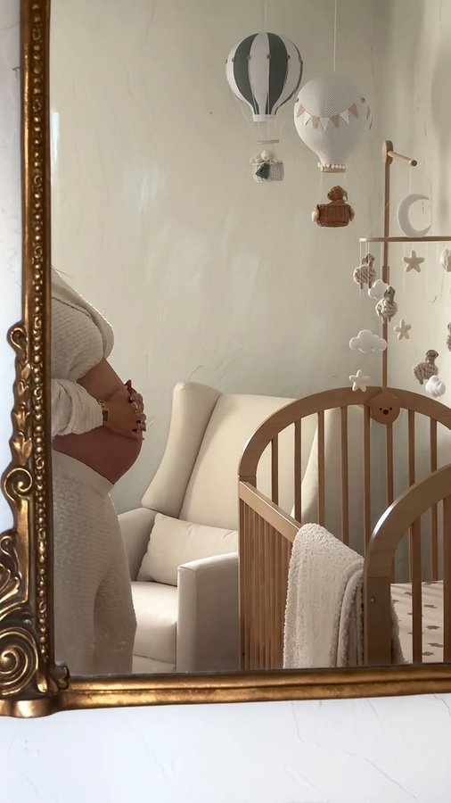 Instagram post by @samanthakatew for Babyletto. Caption reads: My dream nursery recliner + glider from @babyletto....