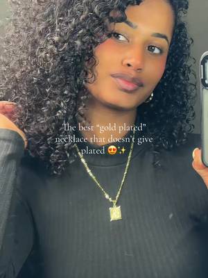 TikTok post by @_blindianbeauty_ for Kissyan Jewelry. Caption reads: #gold #necklace #fyp #jewlery #accessories....