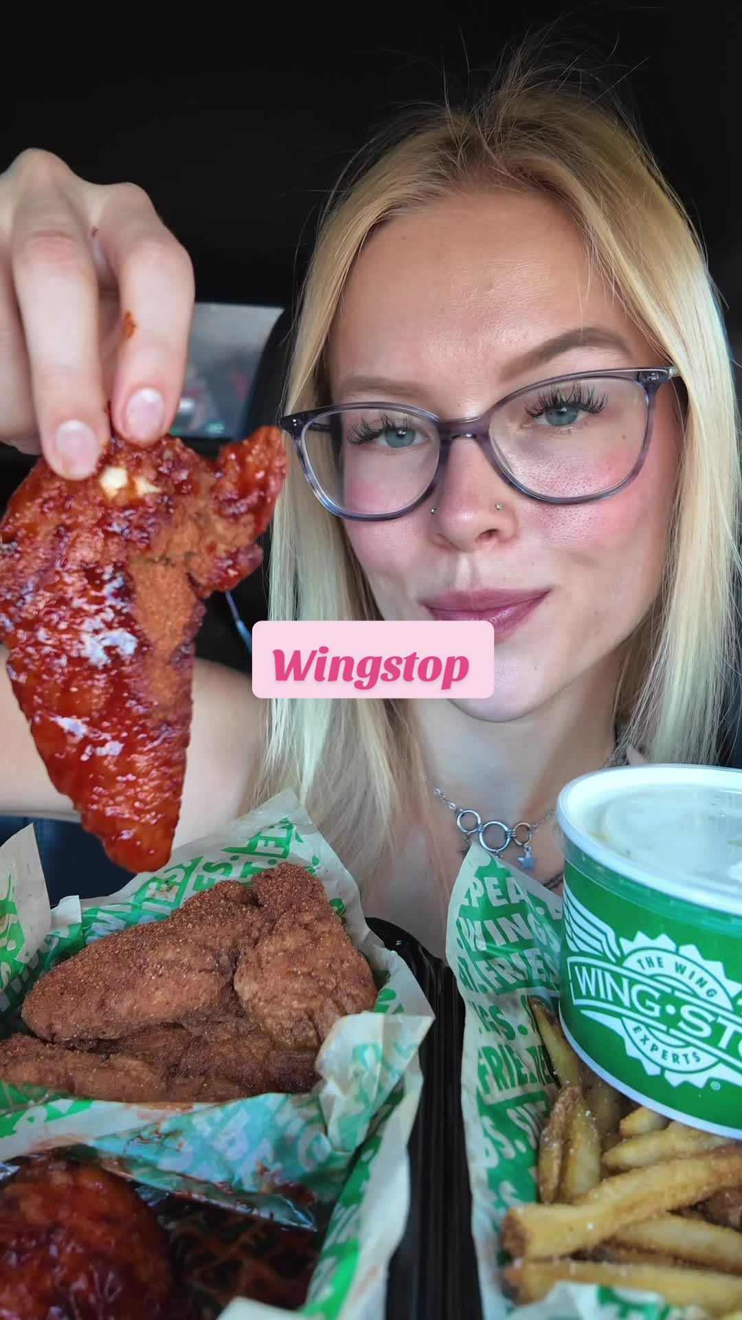 TikTok post by @jilly.eats for Wingstop. Caption reads: Wingstop mukbang! Trying their new fiery lime....