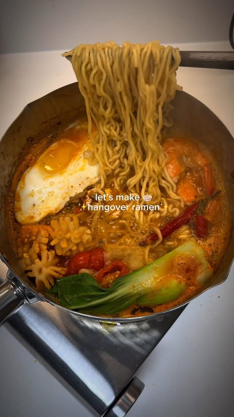 Instagram post by @haileyateit for Nongshim USA. Caption reads: Hangover🫠? A spoon of chili oil and seafood make....