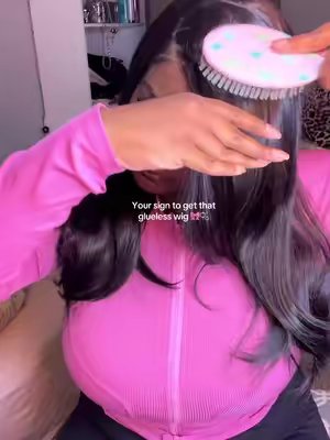 TikTok post by @itssryanlynn for UA Hair. Caption reads: [...] is your sign to get that glueless wig 💕@UA....