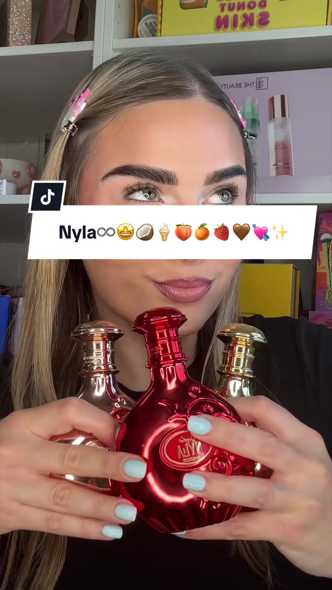 TikTok post by @callieaiello for Salsabeel Perfumes. Caption reads: Nyla always♾️😍🤎🥥🍑🍦🍊🍓🍮🤩💘✨ @SALSABEEL....