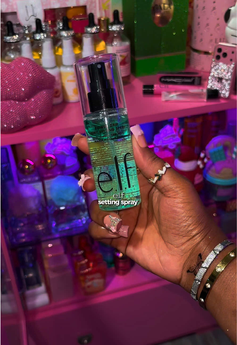 TikTok post by an influencer for e.l.f. Cosmetics. Caption reads: [...] skin soo moisturized! 🔥 @e.l.f. Cosmetics....