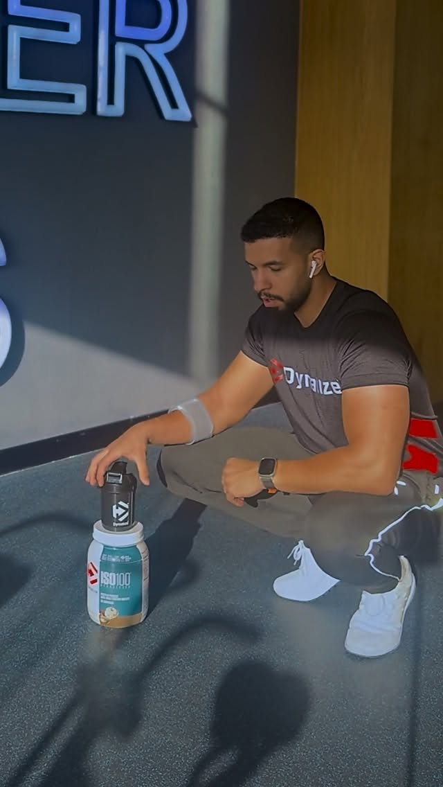 Instagram post by @jacksons.fit for Dymatize. Caption reads: Reps build the shape. Protein writes the story 🔥....