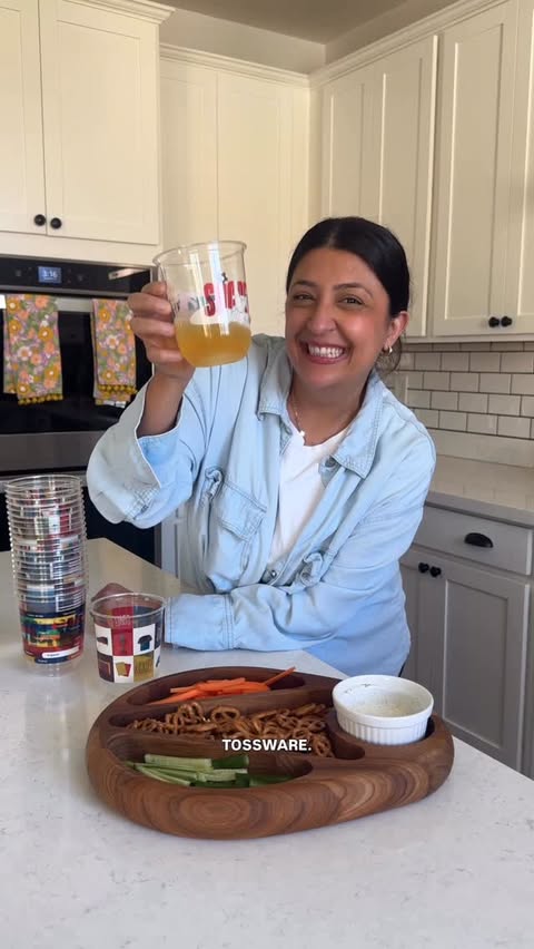 Instagram post by @lifewithmamameg for Tossware. Caption reads: [...] cutest soccer watch party cups from....