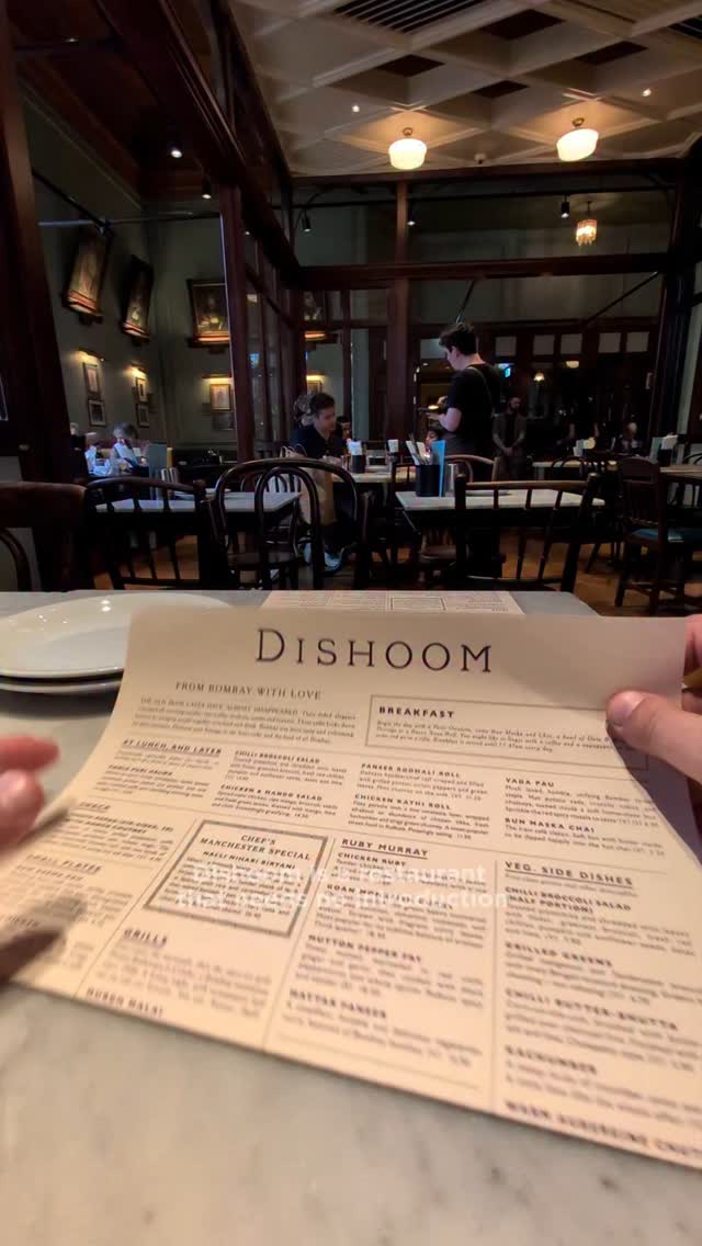 Instagram post by @robbie.reviews for Dishoom. Caption reads: @dishoommcr is a restaurant that needs no....