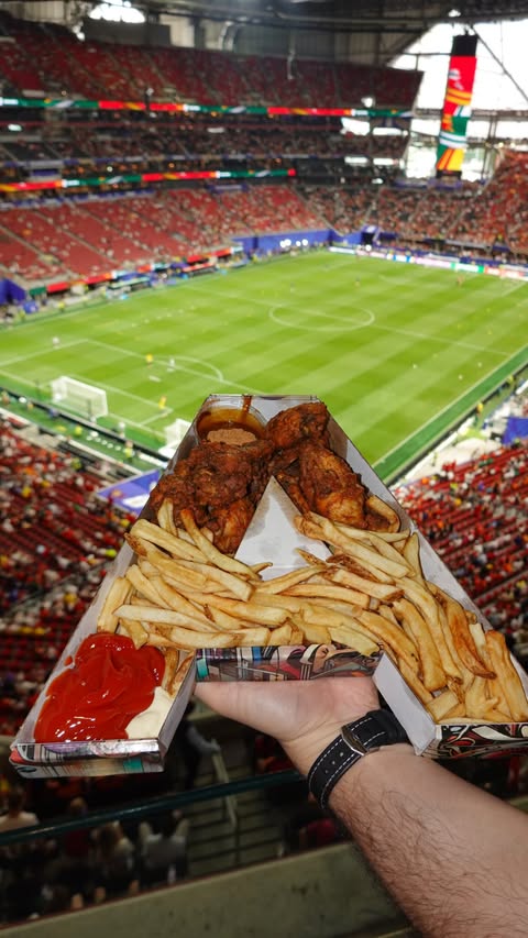 Instagram post by @explorewithgg for FIFA. Caption reads: [...] food item, the A BOX during the....
