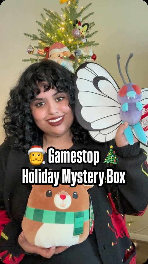Instagram post by @curlyswirlymaria for GameStop. Caption reads: [...] me an early Christmas gift from @gamestop 🤩....