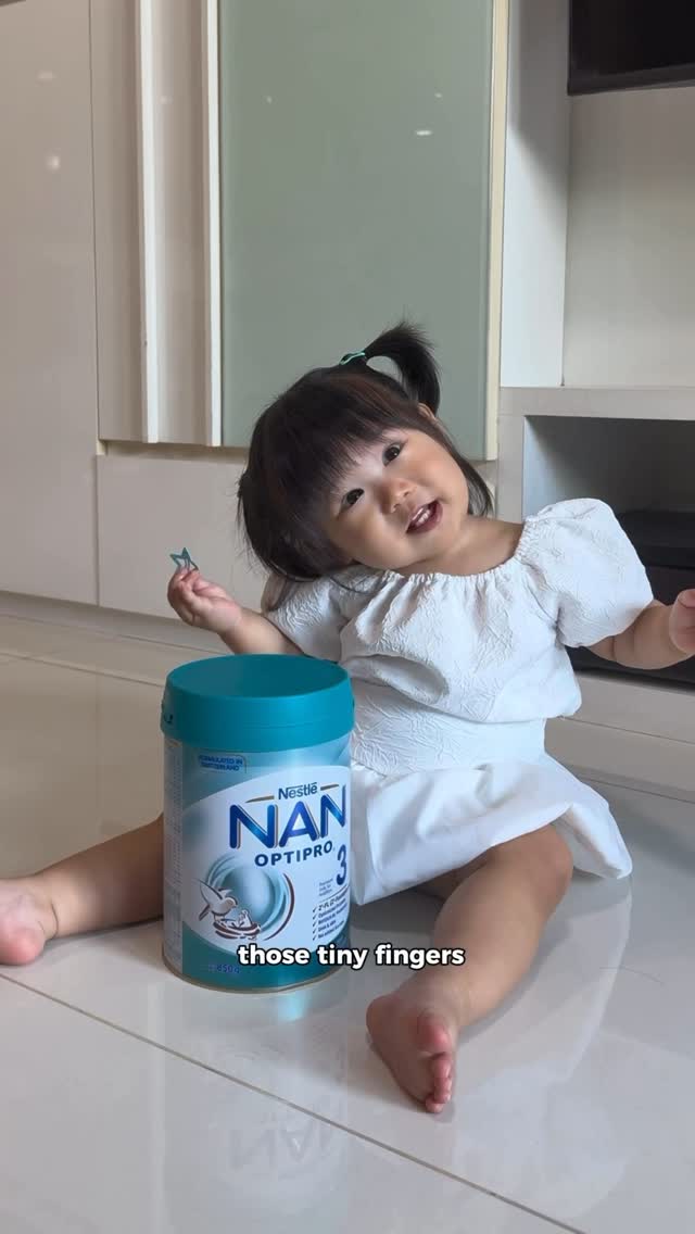 Instagram post by @kextay for NAN Growing Up Milk Singapore. Caption reads: It is amazing how time passes in a blink of an....